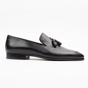 A pair of Calvano men's black leather loafers with tassel details, showcasing premium craftsmanship and perfect for everyday South African wear.