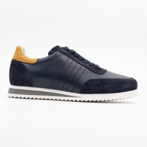 Calvano Leather Trainers in navy blue, showcasing premium craftsmanship.