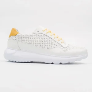 Calvano Mzansi white leather sneakers with perforated detail and yellow accents, showcasing robust design for durable South African style.