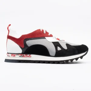 Side profile of Calvano Red Trainers, showcasing premium leather, suede, and mesh details with a distinctive red, black, and white design.