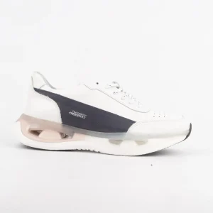 A side profile of the Calvano White & Navy Leather Sneakers featuring navy accents and a cushioned sole